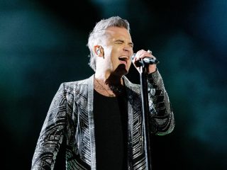 Robbie Williams admite que nunca se sintió “realmente feliz" con su música